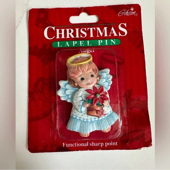 Vintage Gibson Poinsettia Angel
Brooch Resin Angel With A Poinsettia Plant Angel - Picture 1 of 2